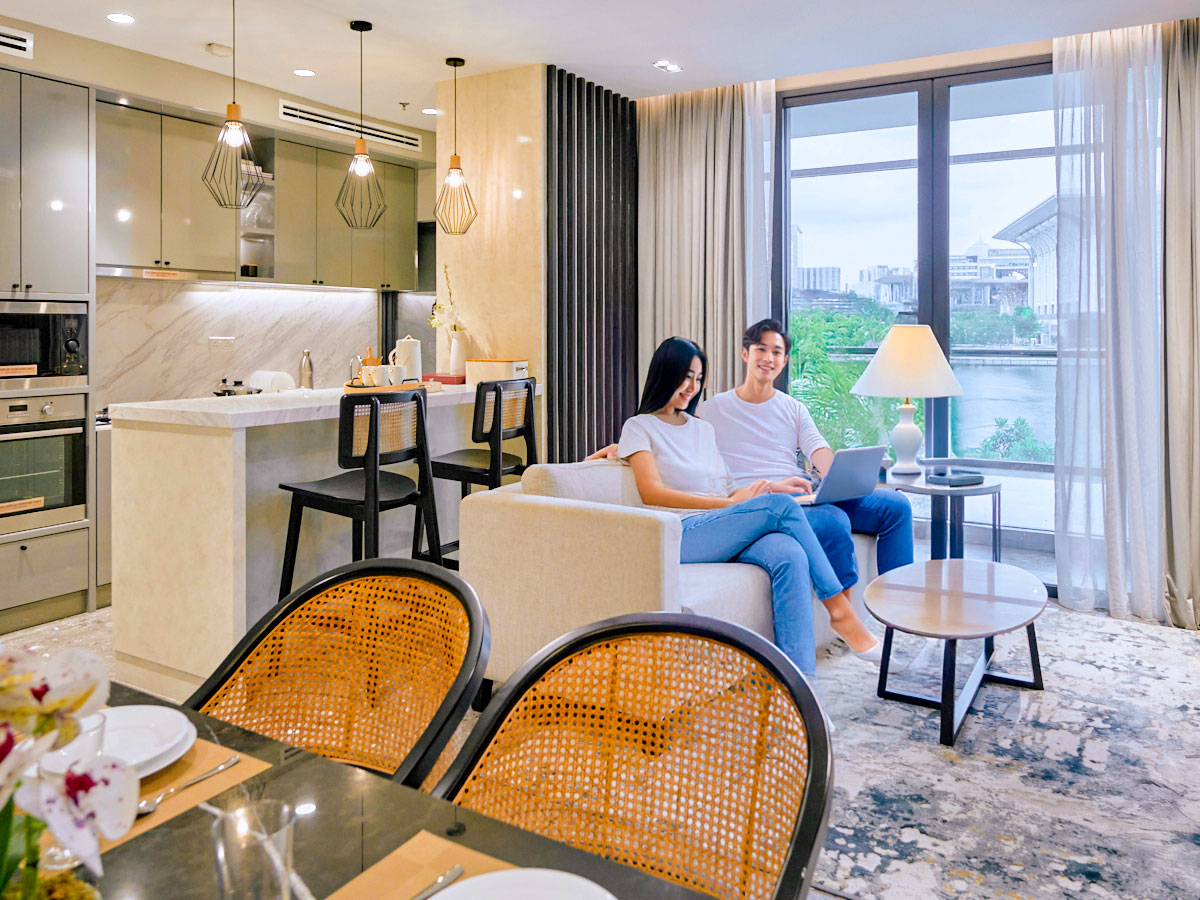 Modern interior with young couple, highlighting contemporary design and property development features